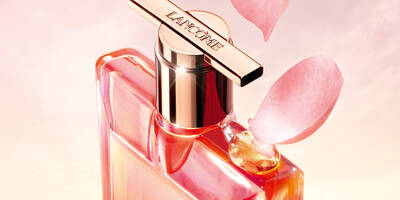 Lancome Idole Rose Perfume with rose flower petals